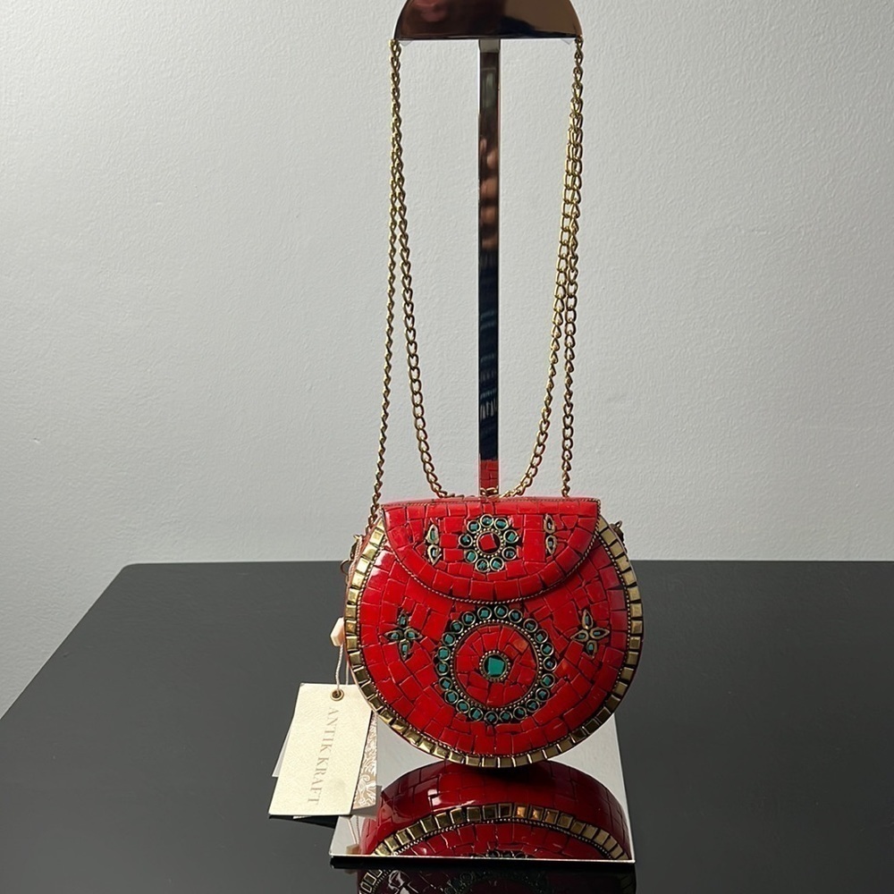 Antik Kraft small metal clutch